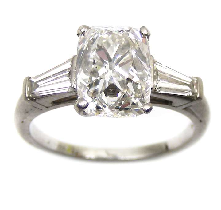 Rectangular cushion cut diamond ring, claw set with a 3.37cts, G SI1 stone